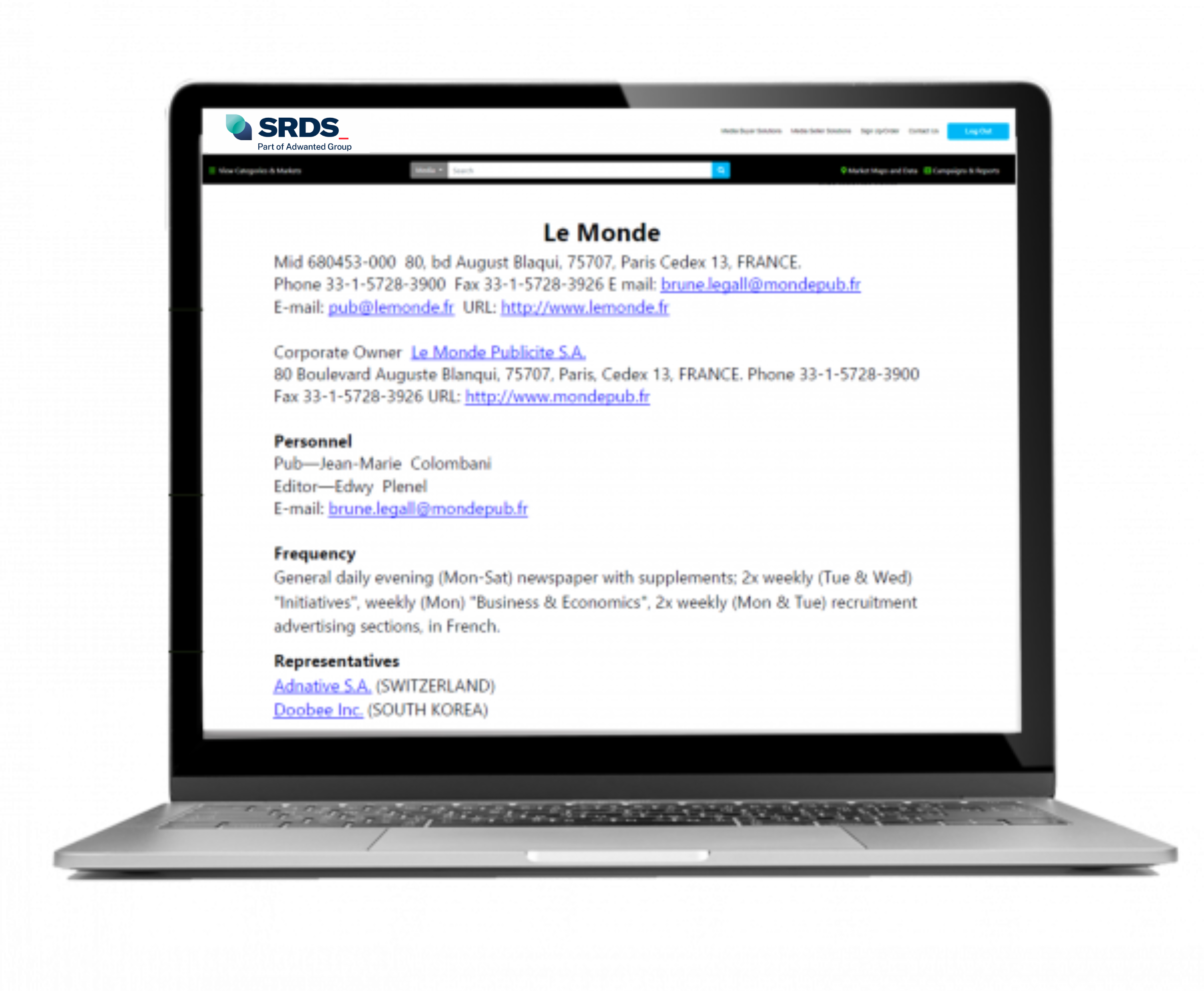 Laptop showing Le Monde site page