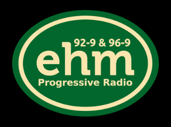 'EHM logo - tan text on a dark green oval